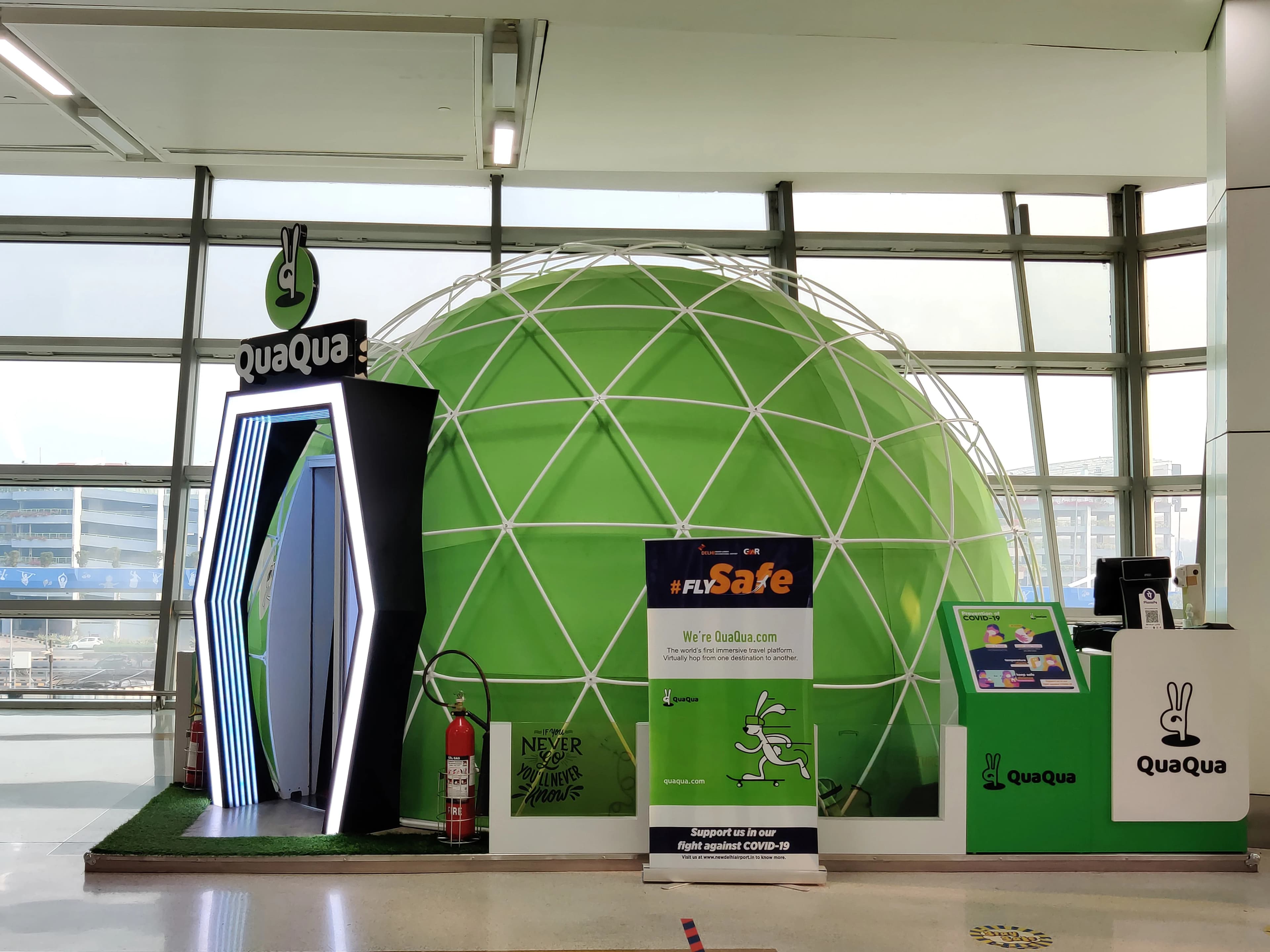 Branded green projection dome at an exhibition